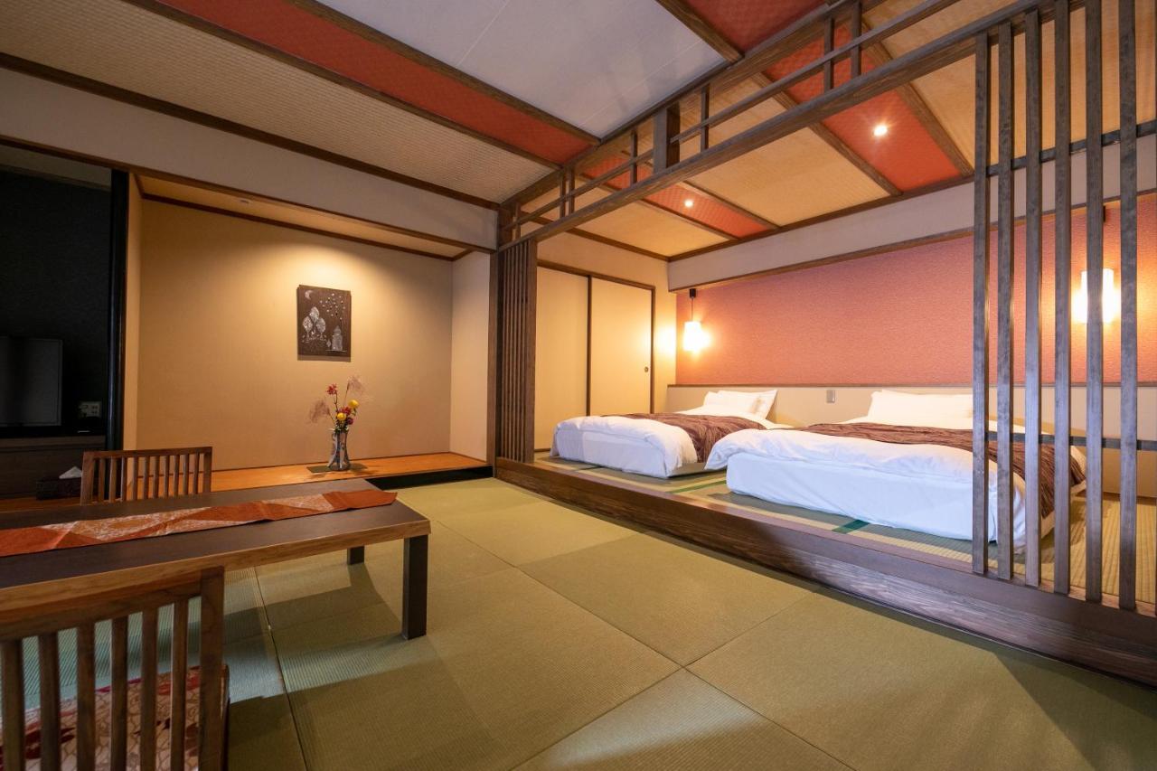 Nansuikaku Hotel Miyawaka Bagian luar foto